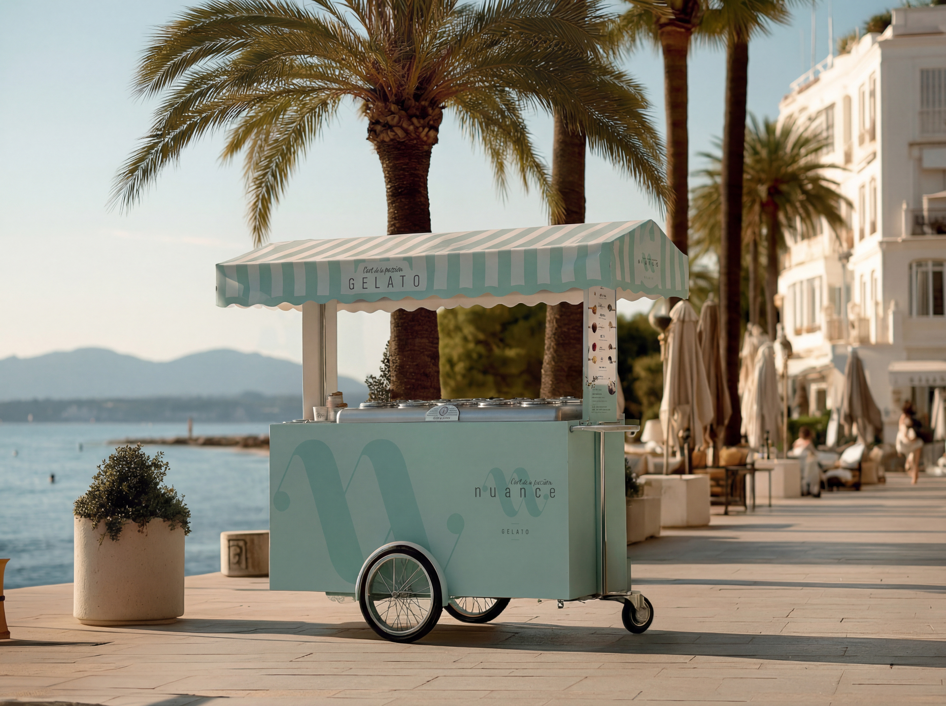NUANCE gelato trolley on a palm-lined seaside promenade